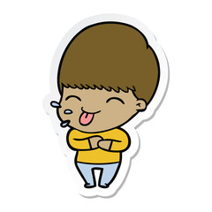 sticker of a cartoon boy sticking out tongue