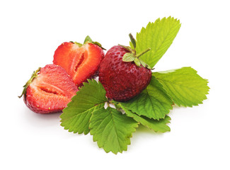 Ripe strawberry with leaves.