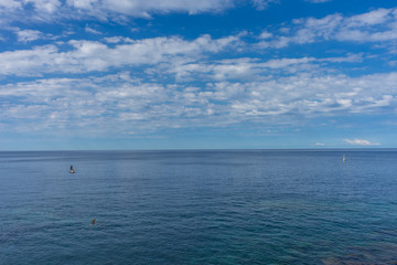 Obraz premium Italy,Cinque Terre,Riomaggiore, a large body of water next to the ocean