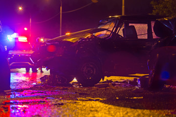 Obraz na płótnie Canvas Night road car accident. Car crash in police lights