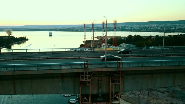 Man walking on a bridge, side view