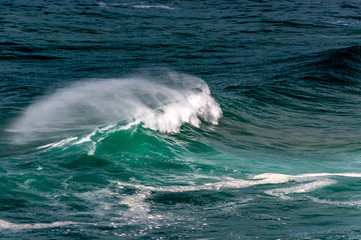 big ocean waves in windsy weather