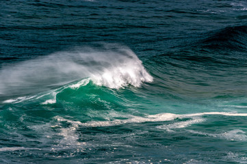 big ocean waves in windsy weather