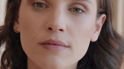 portrait beautiful woman applying makeup getting ready at home looking in mirror enjoying natural complexion morning preparation