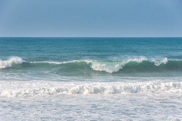 big ocean waves in windsy weather