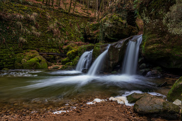 The Schiessentümpel is a small and picturesque waterfall on the Black Ernz river. Mullerthal - Luxembourg’s Little Switzerland.