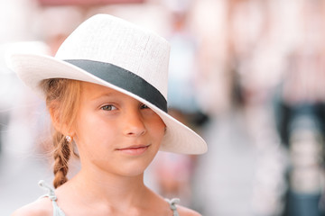 Adorable fashion little girl outdoors in European city Rome