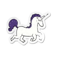 distressed sticker of a cartoon unicorn