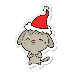 happy sticker cartoon of a dog wearing santa hat