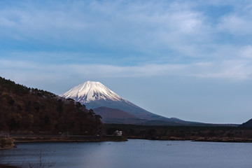 Fototapeta premium Mount Fuji or Mt. Fuji, the World Heritage, view in Lake Shoji ( Shojiko ). Fuji Five Lake region, Minamitsuru District, Yamanashi prefecture, Japan. Landscape for travel destination.