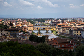 Fototapeta na wymiar Florence with Ponte Vecchio and river Arno