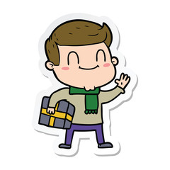 sticker of a cartoon friendly man with xmas gift
