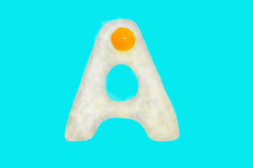 Fried egg in the shape of the letter X