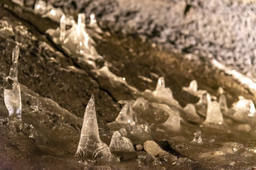 Wind Cave & Ice Cave in Fugaku Japan. The Fuji Fugaku Wind Cave is surrounded by the abundant greenery of the Aokigahara Jukai forest. Once you enter the cave, it is pleasantly cool even in summer