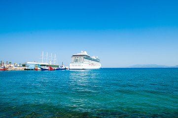 white ship in port. Cruise ship at sea
