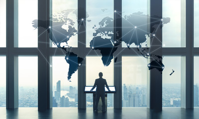Business man working with computer interface of globalization conceptual