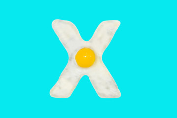 Fried egg in the shape of the letter X