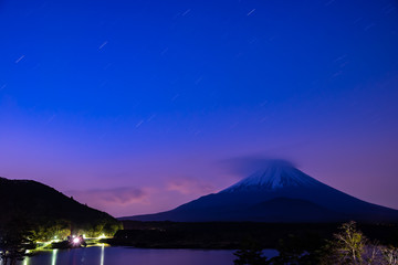 Fototapeta na wymiar Mount Fuji at twilight after sunset, the World Heritage, view in Lake Shoji ( Shojiko ). Fuji Five Lake region, Minamitsuru District, Yamanashi prefecture, Japan. Landscape for travel destination.