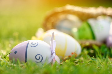 Decorative eggs on green grass for Easter celebration