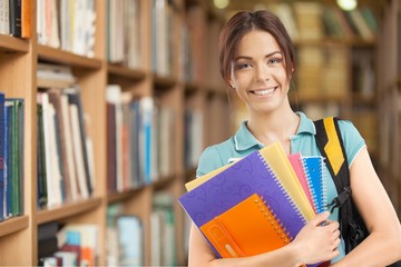 Young Female College Student in Library.