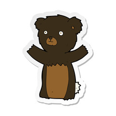 sticker of a cute cartoon black bear