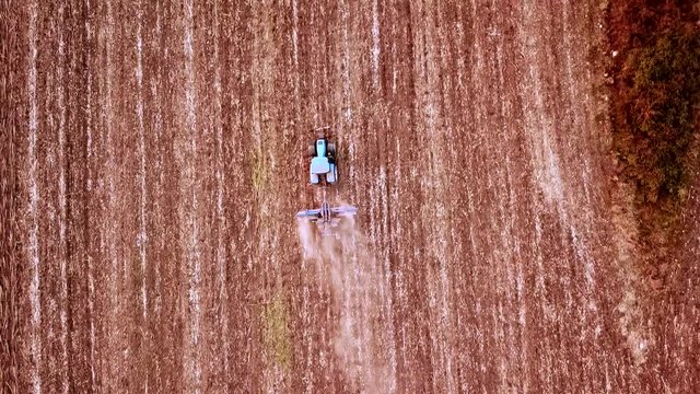 Top view of tractor working on land