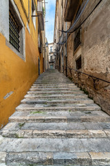 Fototapeta na wymiar Narrow Pedestrian Street in Girona, Spain
