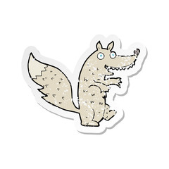 retro distressed sticker of a cartoon wolf