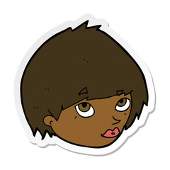 sticker of a cartoon female face looking up