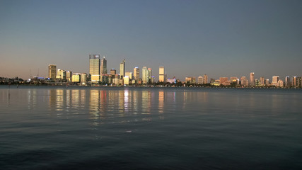 Fototapeta na wymiar sunset wide shot of the city of perth and the swan river from south perth esplanade