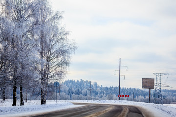 Snowy winter road. The road is covered up. Russian dear. Winter fairy tale