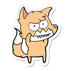 sticker of a cartoon grinning fox