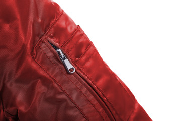 Close up of red jacket sleeve zipper , winter fashion outfit. Jacket isolated on white background.