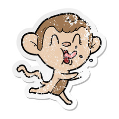 distressed sticker of a crazy cartoon monkey