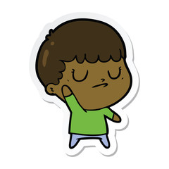 sticker of a cartoon grumpy boy