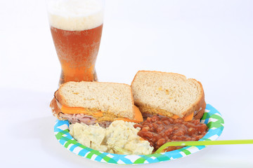 Beer with Ham and Cheese Sandwich and Potato Salad and Baked Beans