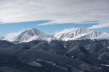 Fototapeta na wymiar Wind Blown Snowy Peaks seen from Keystone, Colorado