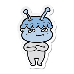 sticker of a friendly cartoon spaceman
