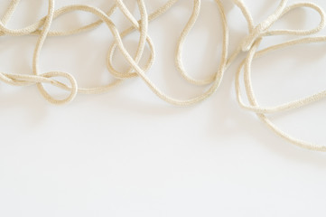 Tangled rope on white background.