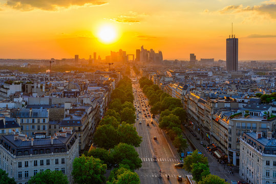 Skyline of Paris with la Defense is a major business district in Paris, France. Panoramic sunset view of Paris