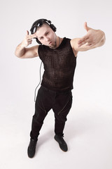 stylish young men of the rapper showing cool hand gesture.