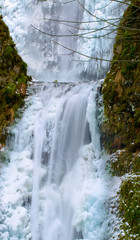 Icy Blue Frozen Waterfall in Oregon USA