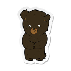 sticker of a cute cartoon black bear