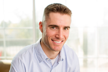 Fototapeta premium Young friendly professional business man