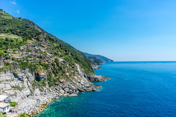 Italy, Cinque Terre, Vernazza, Vernazza, SCENIC VIEW OF SEA AGAINST BLUE SKY