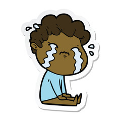 sticker of a cartoon man crying