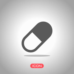 simple symbol of pill or vitamin. Icon under spotlight. Gray background