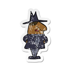 retro distressed sticker of a cartoon man in coat and hat
