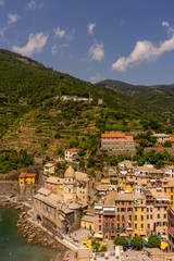 Fototapeta na wymiar Italy, Cinque Terre, Vernazza, Vernazza, HIGH ANGLE VIEW OF TOWNSCAPE AGAINST SKY