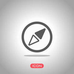 Simple compass icon. Icon under spotlight. Gray background